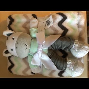 Baby blanket with stuffed animal
